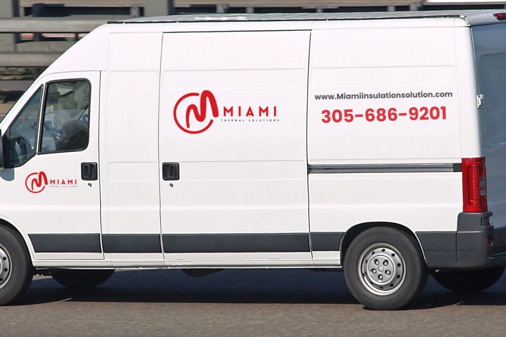 A white delivery van displaying "Miami" logo, website, and phone number on its side.